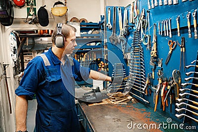 Marine engineer officer in engine control room ECR Stock Photo