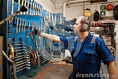 Marine engineer officer in engine control room ECR Stock Photo