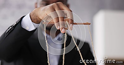 Marionette Manipulation With Hand Holding Puppet Stock Photo