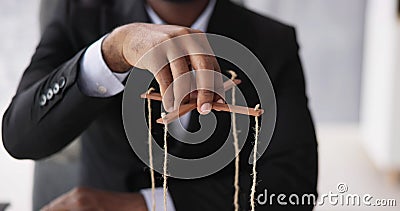 Marionette Manipulation With Hand Holding Puppet Stock Photo