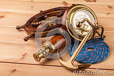 Maritime adventure old anchor and old telescope Stock Photo