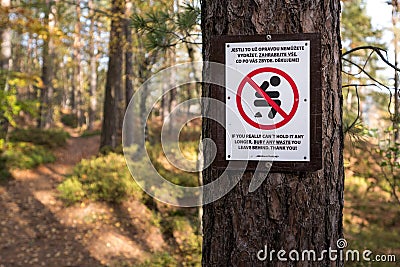Please do not shit in the forest Stock Photo