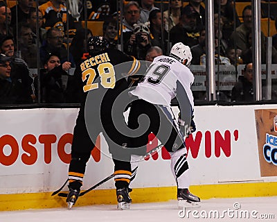 Mark Recchi goes against Dominic Moore. Editorial Stock Photo