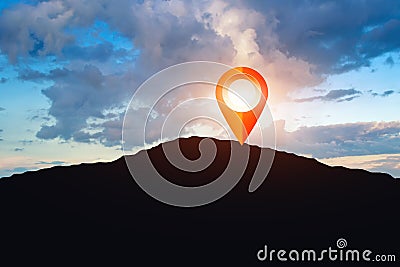 Marker navigation point on top of the mountain, sunset sky with Stock Photo