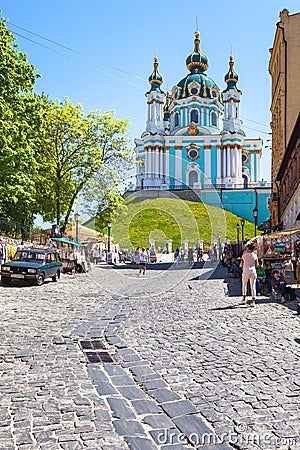 Market on Andriyivskyy Descent and view of Church Editorial Stock Photo