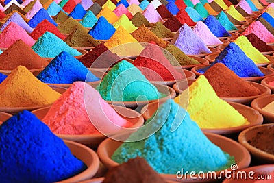 Various spices selection. multicolored powder dyes in a market Stock Photo