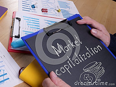 Market capitalization is shown on the business photo using the text Stock Photo