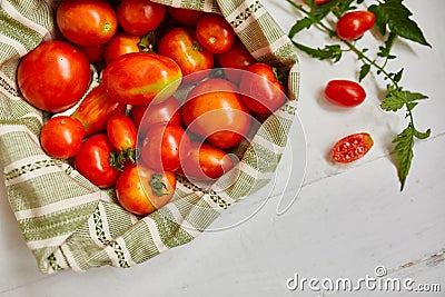 Market delivary of red tomatoes in eco textile bag, Zero waste Stock Photo