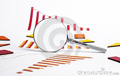 Market fall, economic crisis analysis. Magnifying glass and charts, diagrams showing financial instability, business Stock Photo