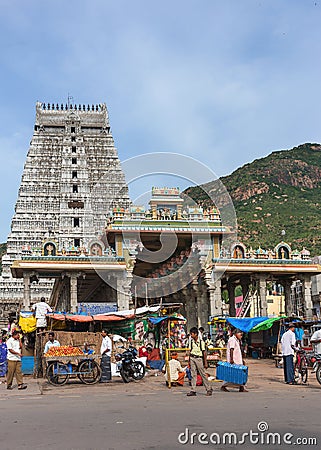 Market, glorious covered marquee, eastern Gopuram and the holy m Editorial Stock Photo