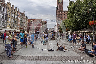 Market in the old part of Gdansk with many happy people on the street, nice summer dayK Editorial Stock Photo