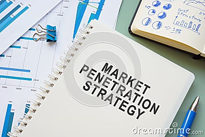 Market penetration strategy on the stack of business papers. Stock Photo