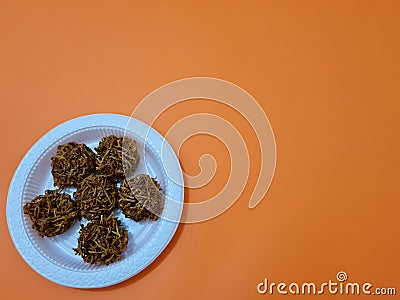 A market snack made from grated sweet potato that is fried has a sweet taste, the name is carang mas Stock Photo