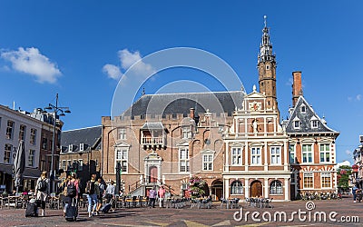 Market square with people and town hall in Haarlem Editorial Stock Photo