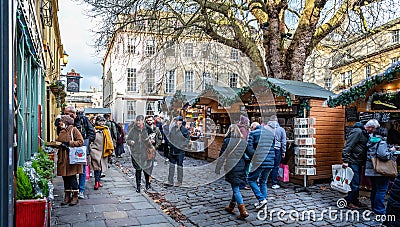 Market stalls at Bath Christmas Market in Abbey Green, Bath, Somerset, UK Editorial Stock Photo