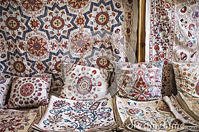 Market stalls with decorative tribal textile with colourful pattern made in Central Asia, Uzbekistan. Editorial Stock Photo