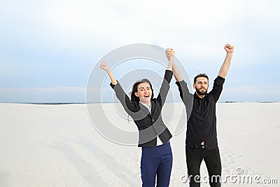 Marketers male and female rejoicing at start of vacation at se Stock Photo