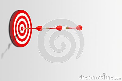 Three red darts hit target on dartboard, Stock Photo