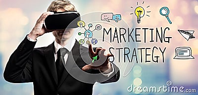 Marketing Strategy text with businessman using a virtual reality Stock Photo