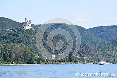 Braubach, Germany - 06 05 2023: Marksburg, and a Cruise Ship on the Rhine Editorial Stock Photo