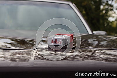 Marlboro Red on car's hood Editorial Stock Photo