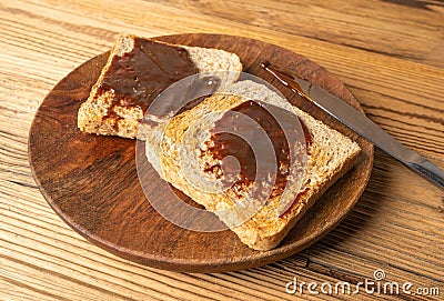 Marmite Yeast Spread, Vegemite Spread, Australian Healthy Breakfast, Traditional English Yeast Extract Stock Photo