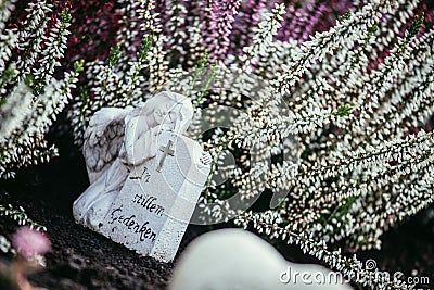 Marmoreal white Angel at the cemetery Stock Photo