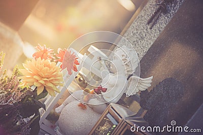 Marmoreal white Angel at the cemetery, sorrow, sunlight Stock Photo