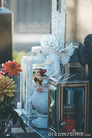 Marmoreal white Angel at the cemetery, sorrow, sunlight Stock Photo