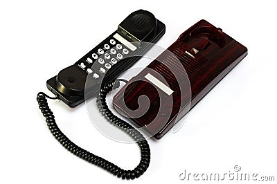 A maroon black colored home analogue line phone Stock Photo