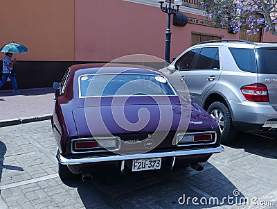 Maroon Chevrolet Camaro exhibited in Lima Editorial Stock Photo