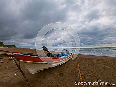 Marooned panga boat in El Salvador Stock Photo