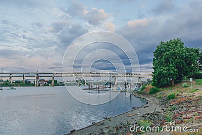 Marquam Bridge over Willamette River with boats in Portland, USA Stock Photo