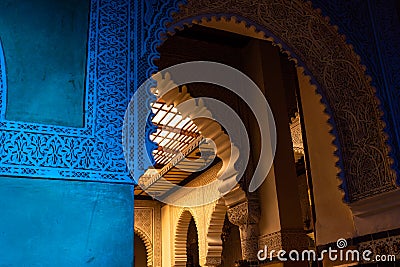 MARRAKESH, MOROCCO - JAN 2019: Moroccan architecture traditional arabian design - Rich Riyad arch mosaic interior detail Editorial Stock Photo