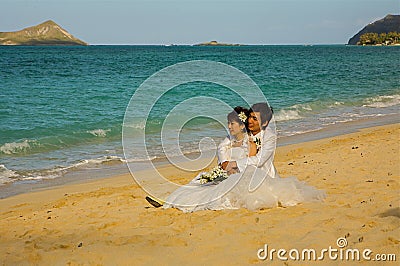 Married Couple on Waimanalo Beach Oahu, Hawaii Editorial Stock Photo