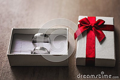 Marry me concept. White box with two engagement rings. Stock Photo