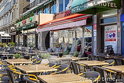 Marseille, France, 10/07/2019: Street cafe on a large square in a European city Editorial Stock Photo