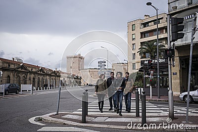 Marseille residents crossing street. Editorial Stock Photo