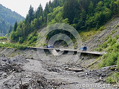 Marshrutka, public minibuses on destroyed dirt road from Ushguli mountain village, Svaneti, Georgia to Mestia. Stock Photo