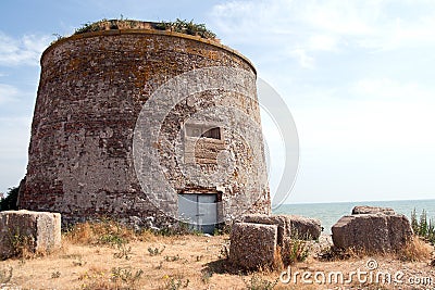 Martello Tower - Old fortification on beach near Eastbourne Stock Photo