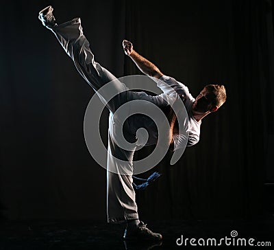 Martial art high kick Stock Photo