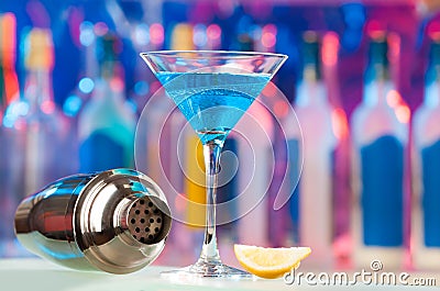 Martini glass, lemon slice and empty shaker Stock Photo