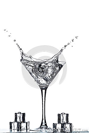 Martini glass with splash Stock Photo