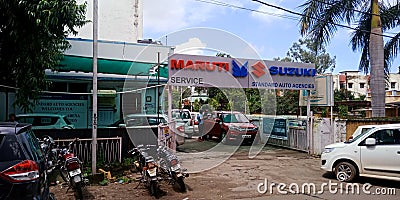 Maruti Suzuki service center at main market street Editorial Stock Photo