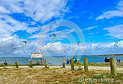 The colorful spring waves and kitesurfers of Brittany Editorial Stock Photo