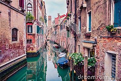 Marvelous summer cityscape of Vennice with famous water canal and colorful houses. Calm morning scene of Italy, Europe. Stock Photo