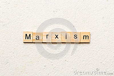 marxism word written on wood block. marxism text on table, concept Stock Photo