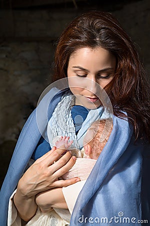 Mary and baby Jesus outdoors Stock Photo