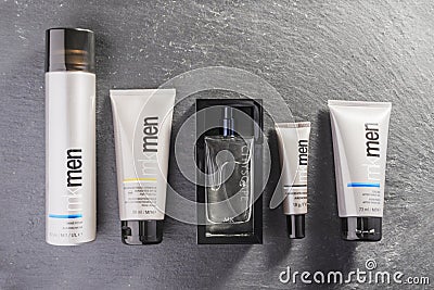 Mary Kay for men cosmetics isolated on stone slate background. Editorial Stock Photo