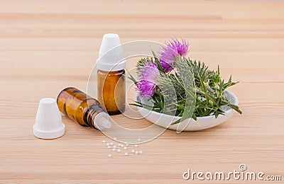 Homeopathic medicine with Mary thistle Stock Photo